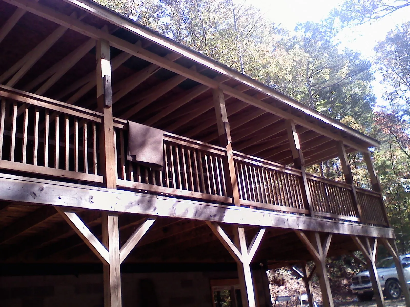 Timber framing under a new elevated porch and deck — Roof Leak Repair in Palm Bay by Roofing Brothers